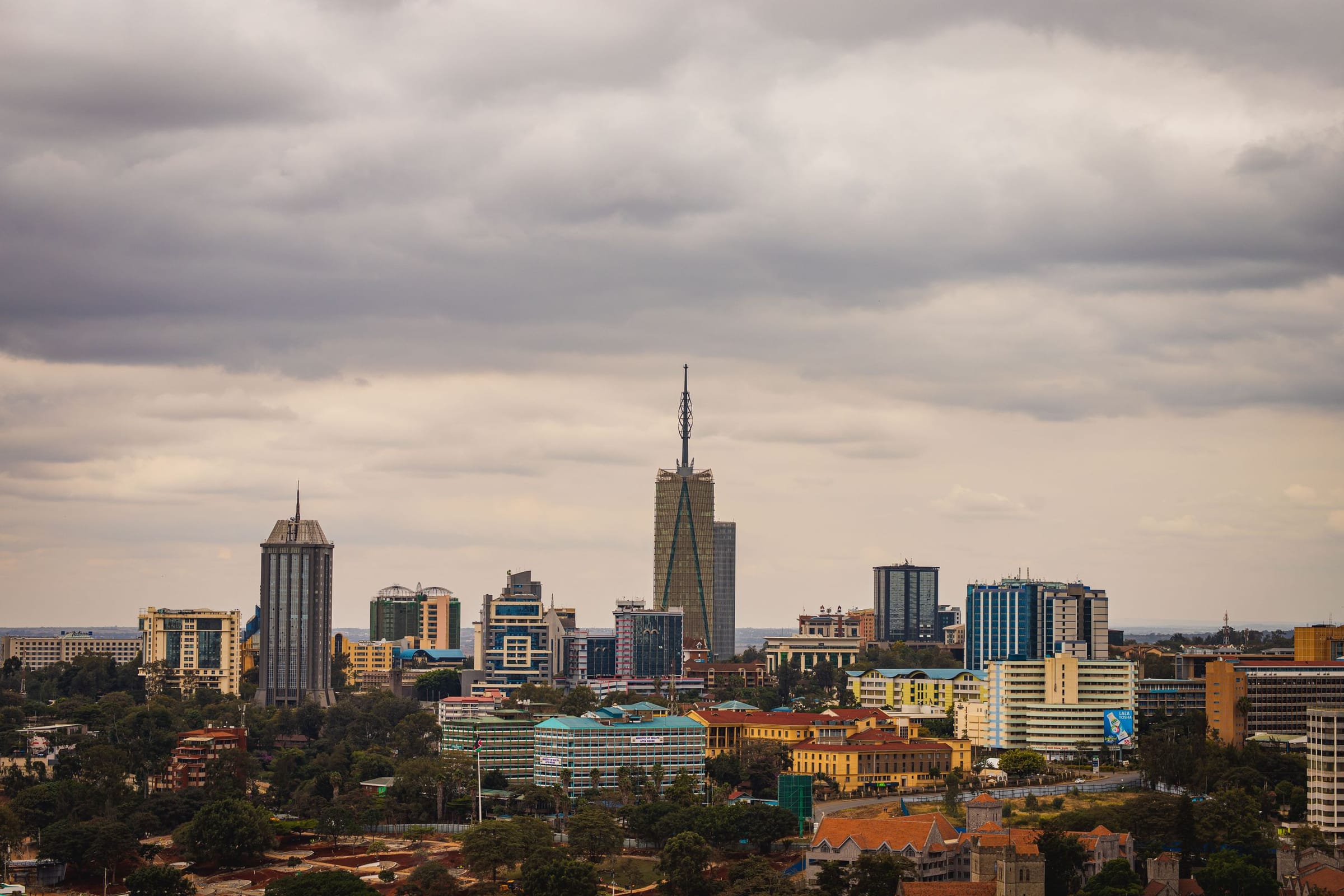 The Nairobi skyline under a cloudy sky