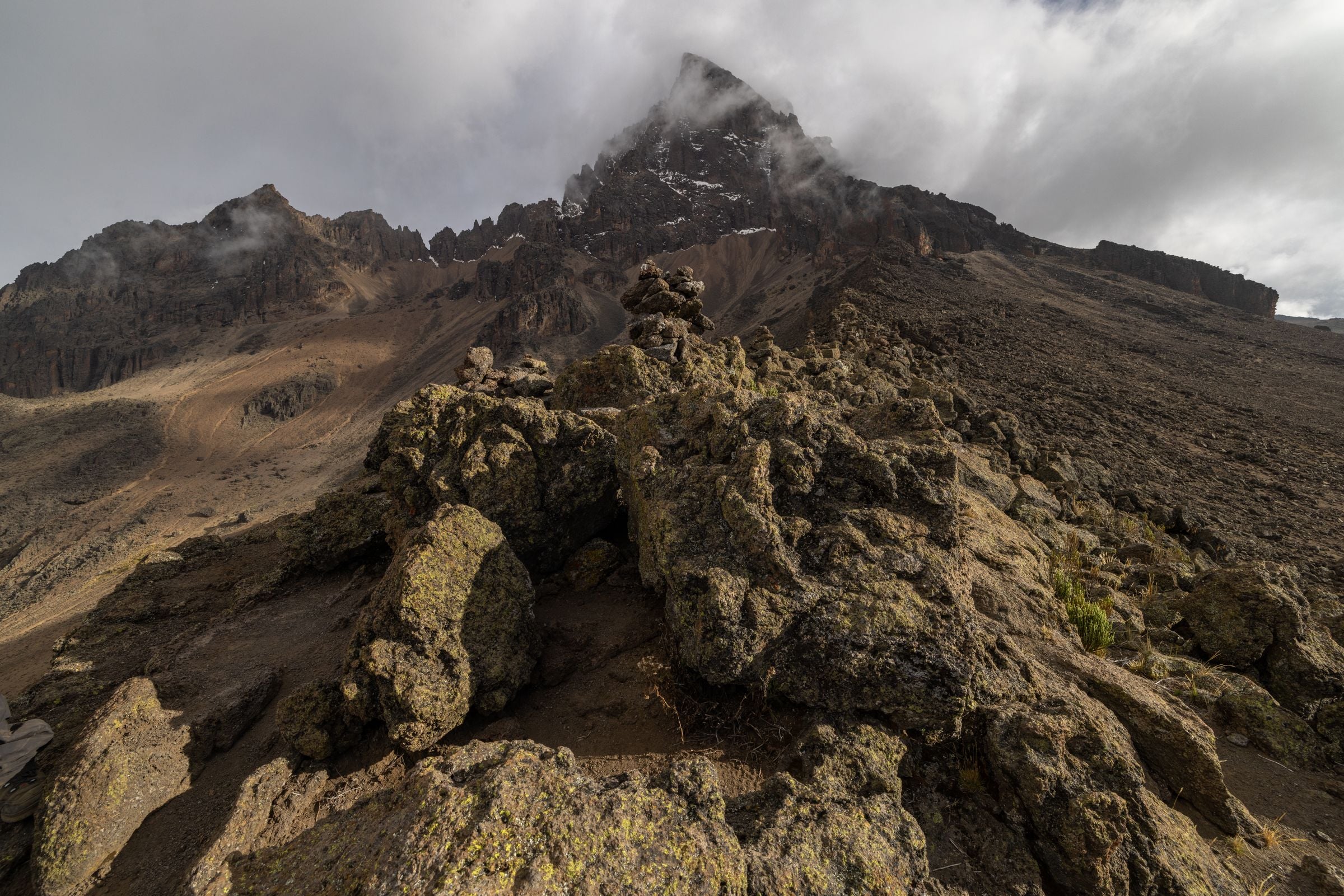 Kilimanjaro's rocky upper slopes under cloud